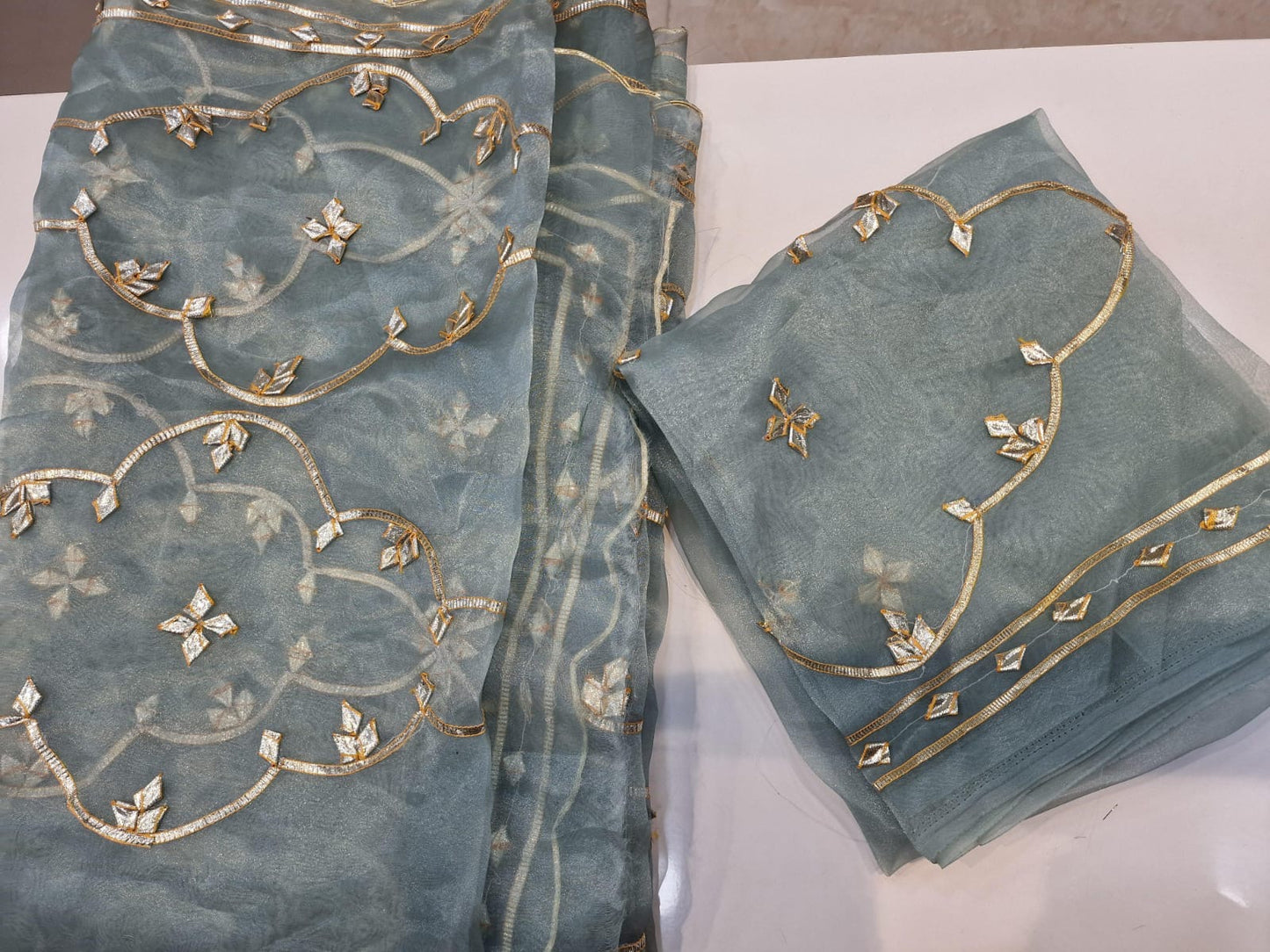 Organza saree with hand patti work